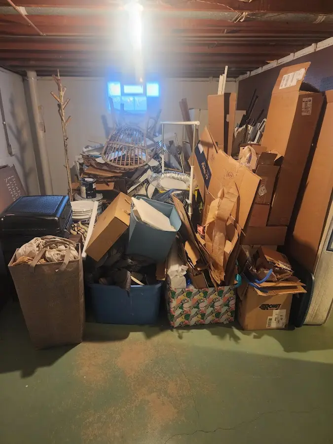 Roll-off dumpster container at job site for 2 Yard Dumpster Rental in Darnestown